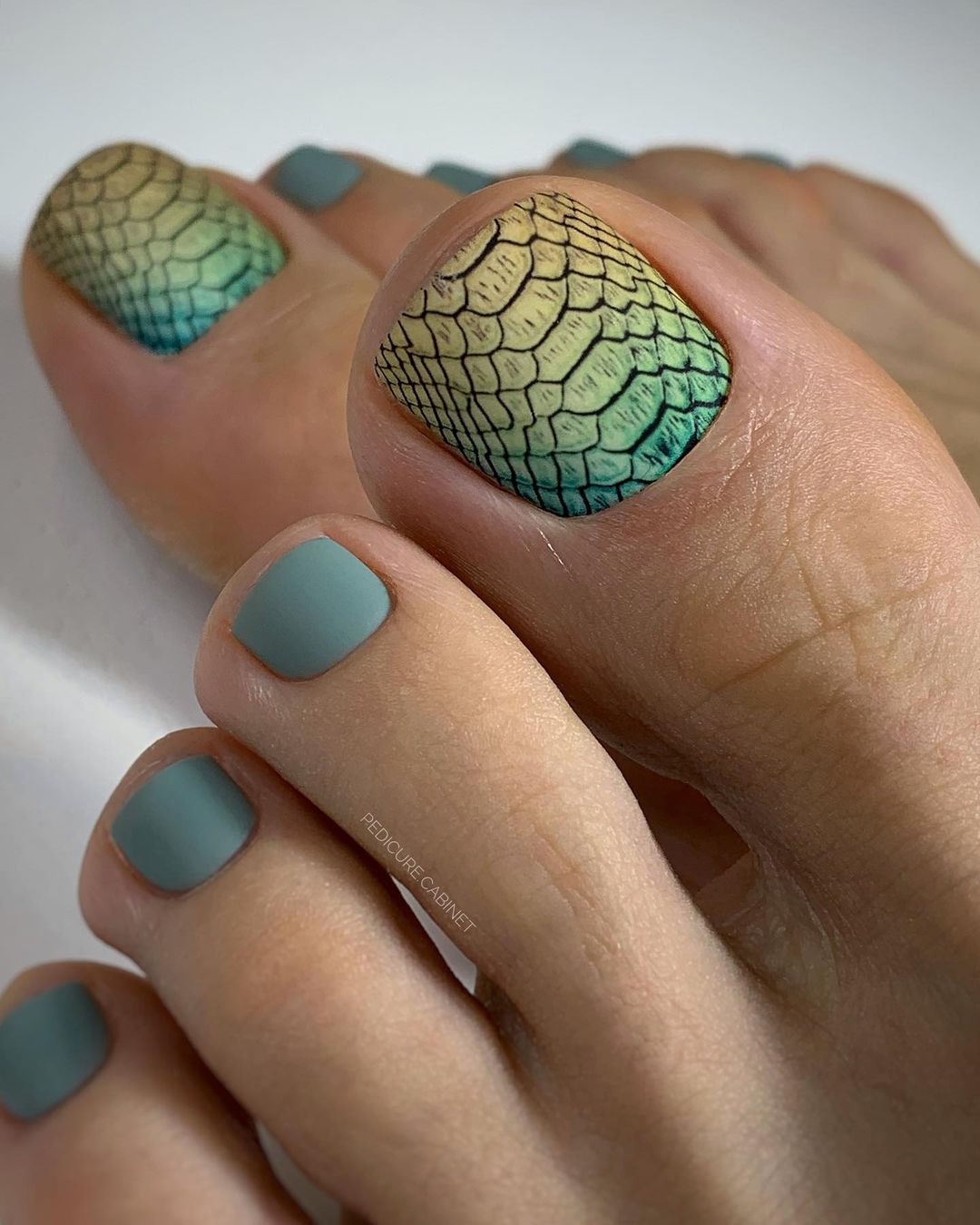 Dark Green Matte Pedicure with Snake Design