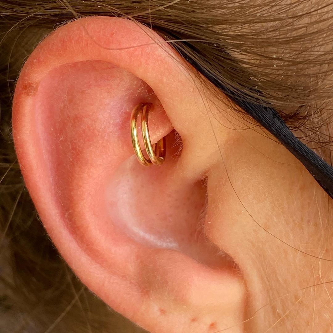Double Ear Piercing Using Gold Hoops