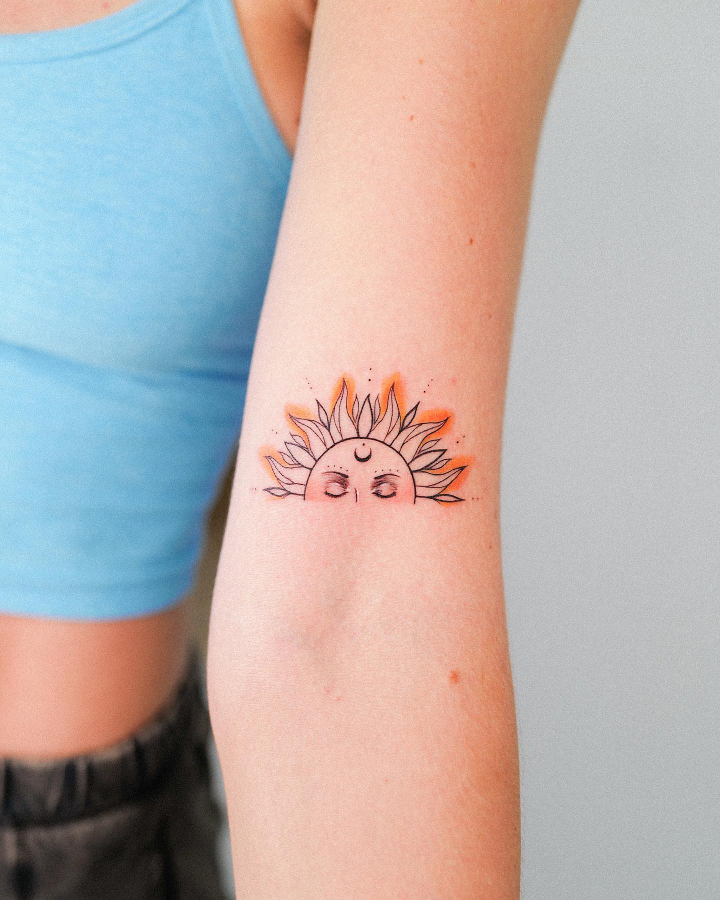 Half Rising Sun Tattoo on Arm