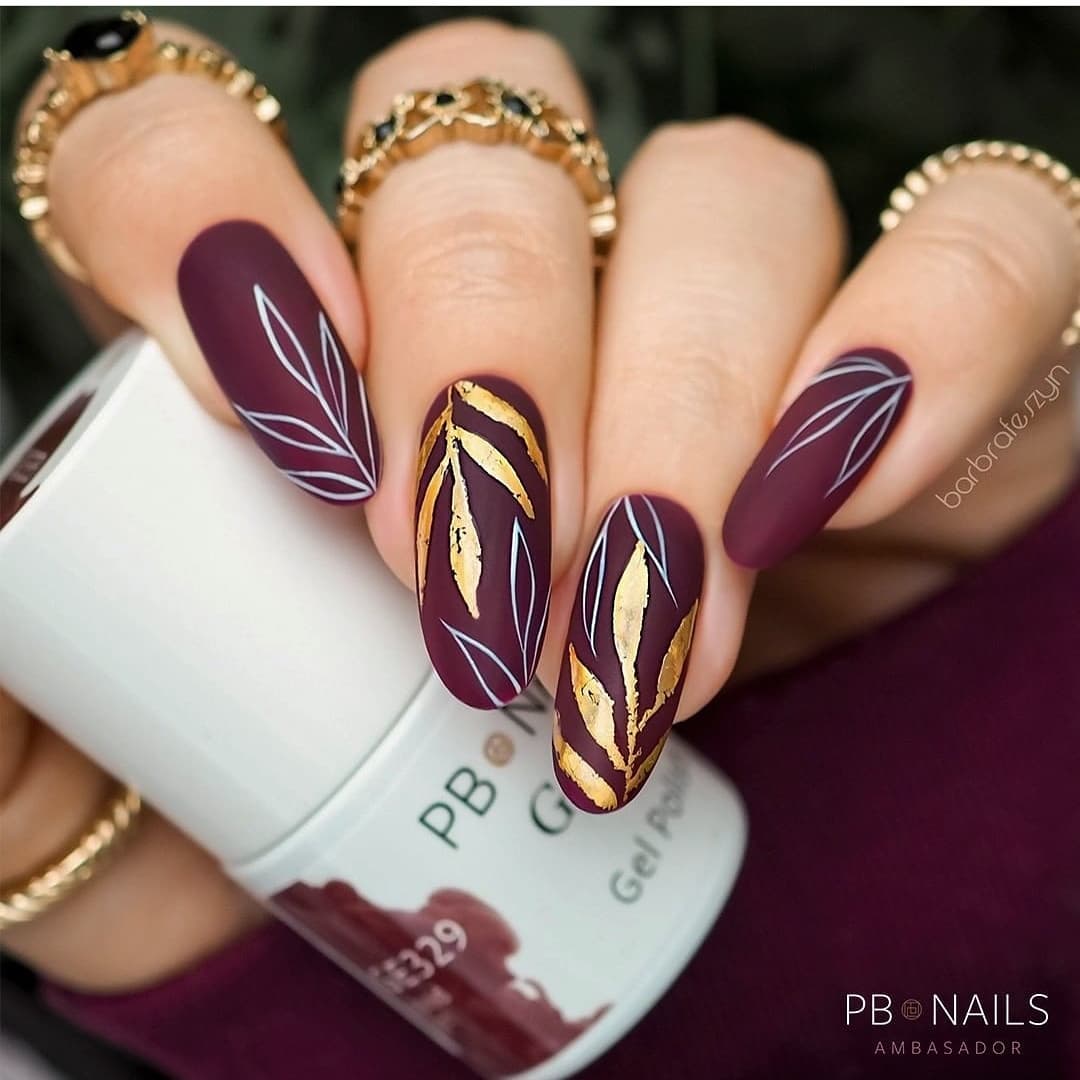 Long Round Matte Burgundy Nails with Floral Design