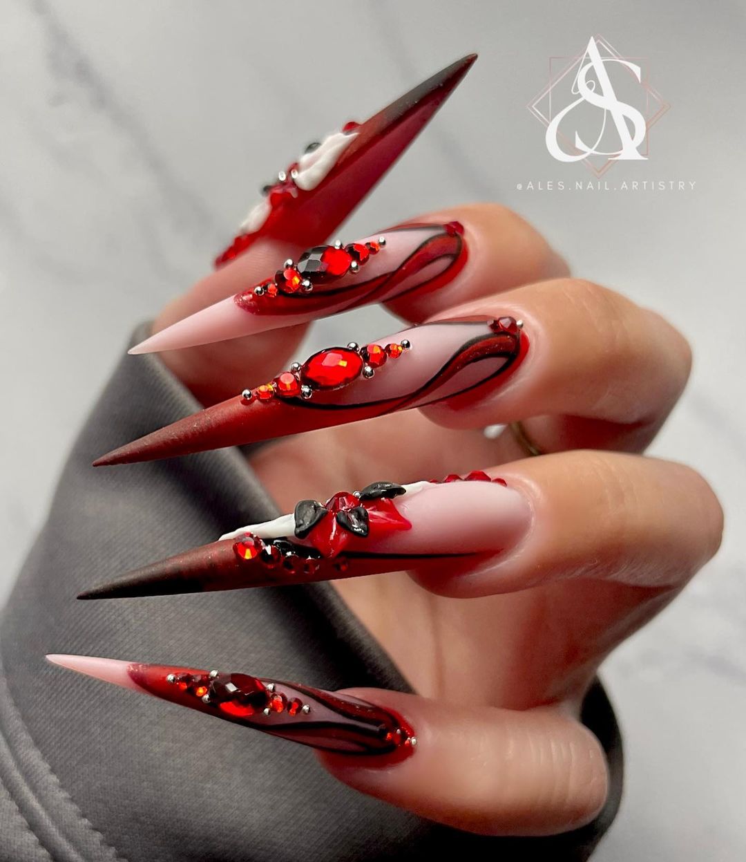 Long Stiletto Nails with Red Design and Rhinestones