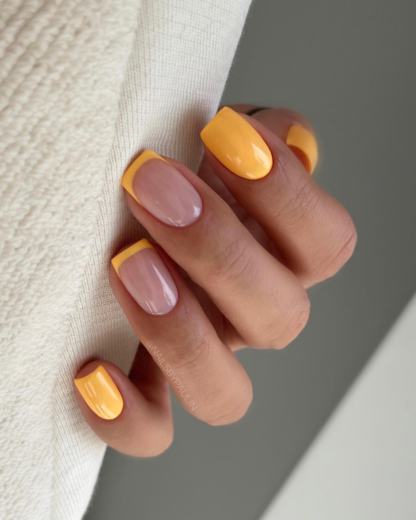 Short Orange Nails with French Tips