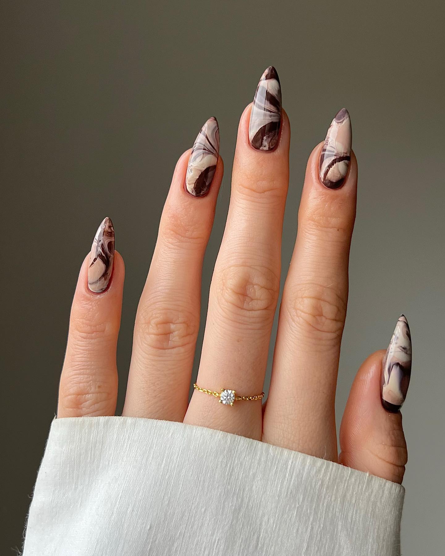 Brown Almond Nails with Marble Design