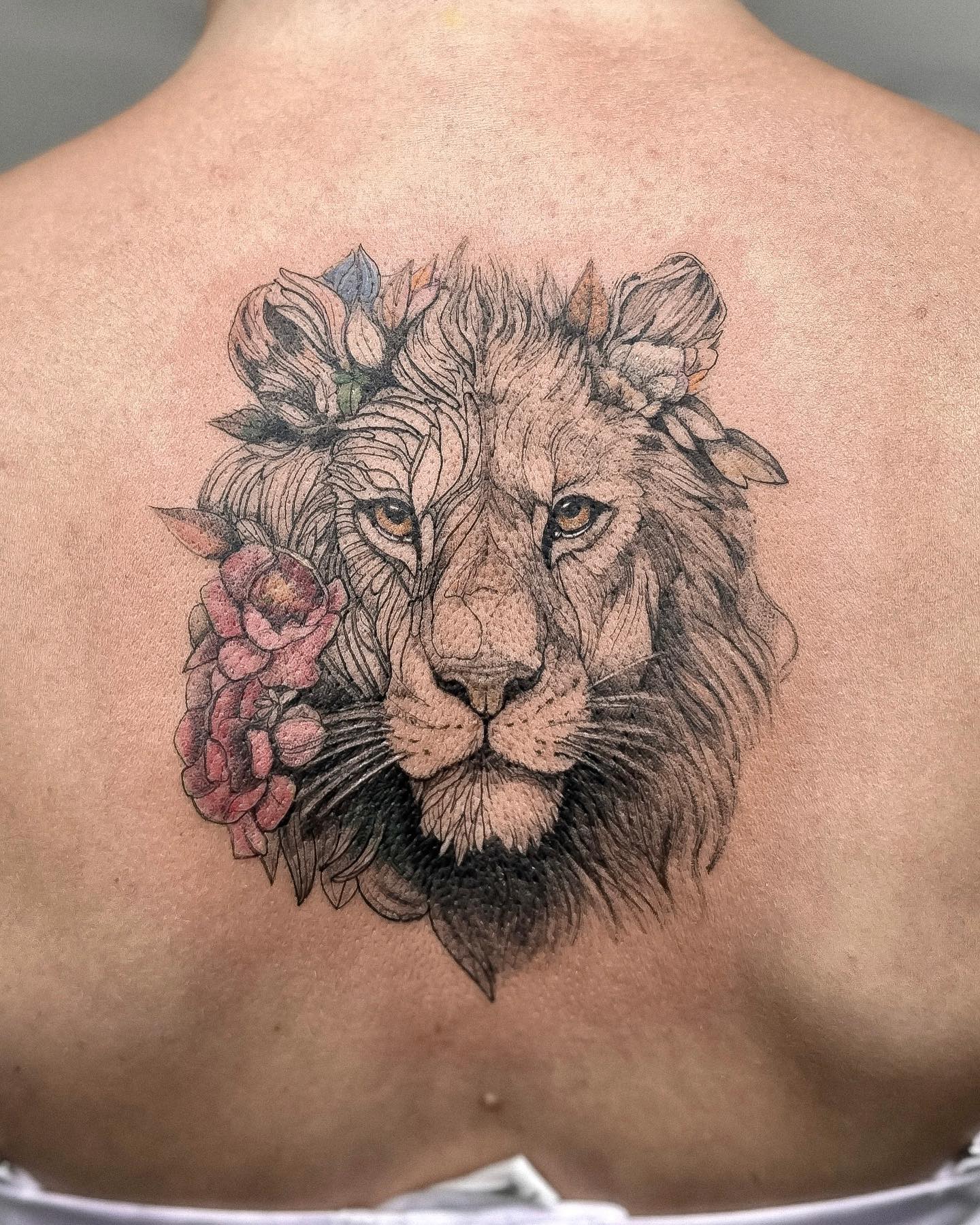 Large Lion on Back Tattoo