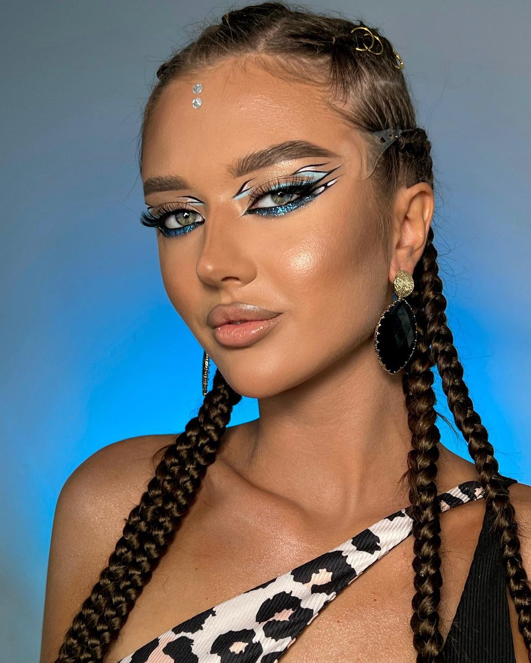 Light Blue Glitter Makeup with White Eye Shadow Design
