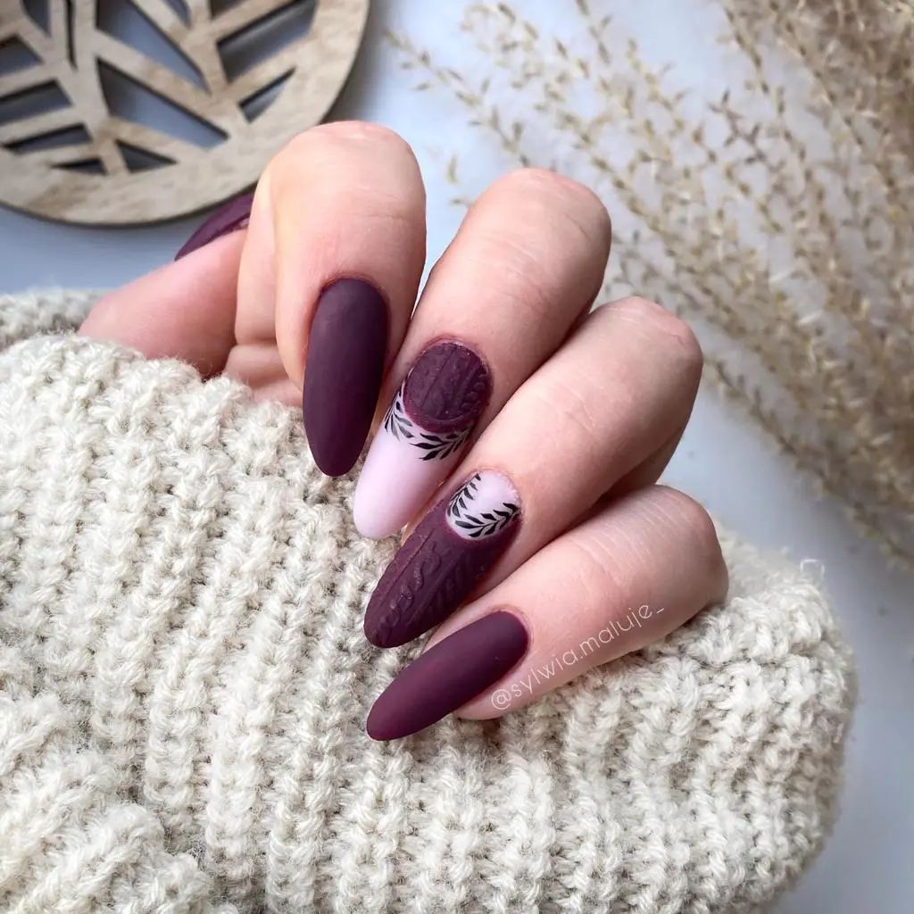 Long Matte Burgundy Nails with Leaf Design