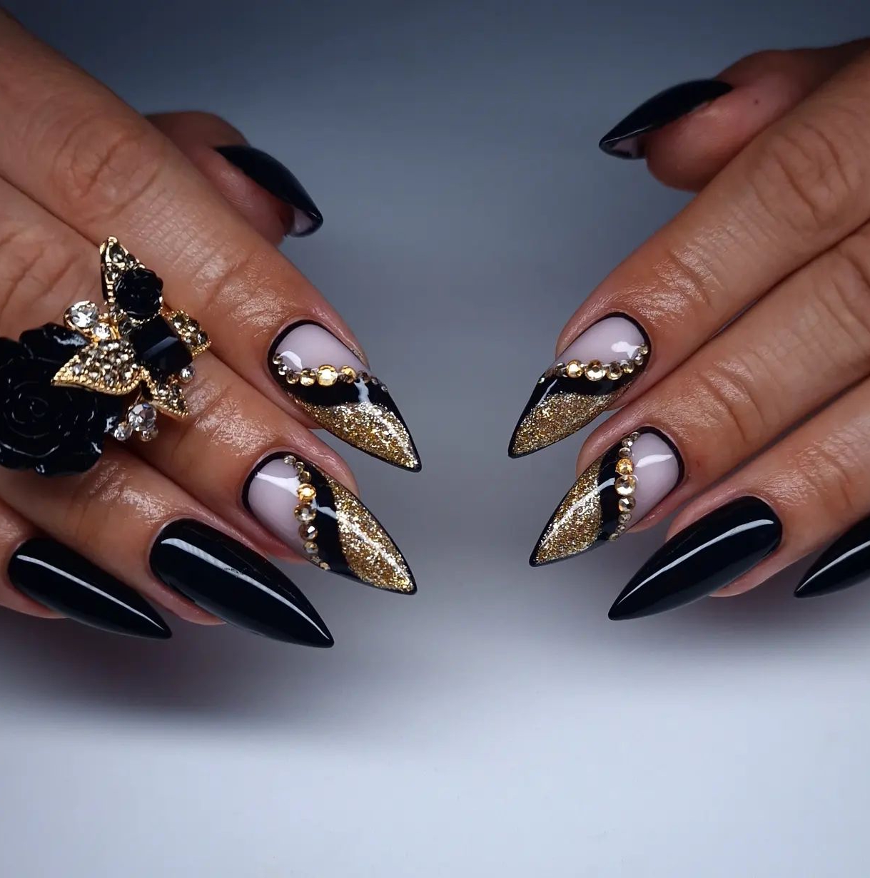 Pointy Black and Gold Nails with Rhinestones
