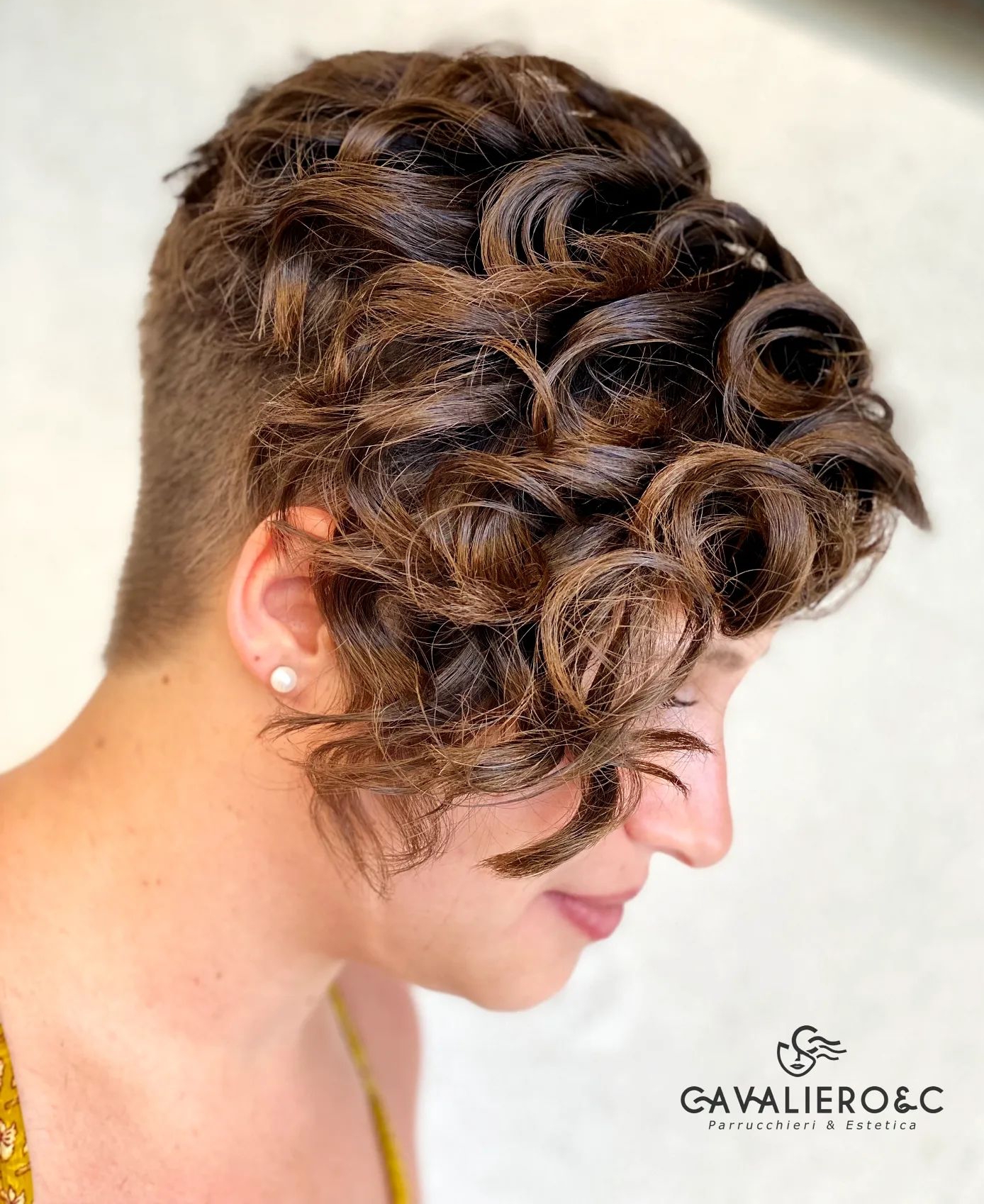 Asymmetric Curly Pixie With Nape Undercut