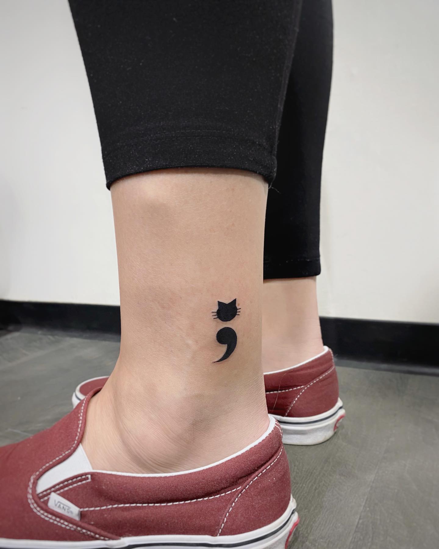 Black Cat Semicolon Tattoo on Ankle