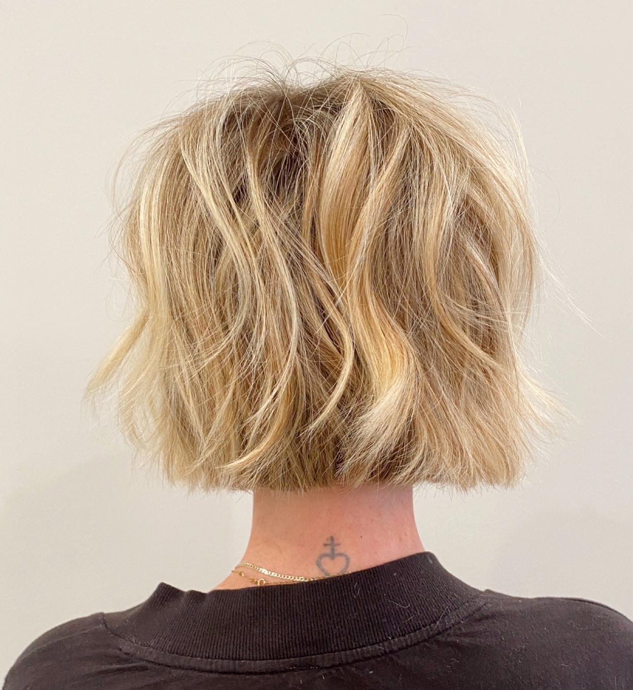 Blunt Layered Bob Cut on Short Blonde Hair