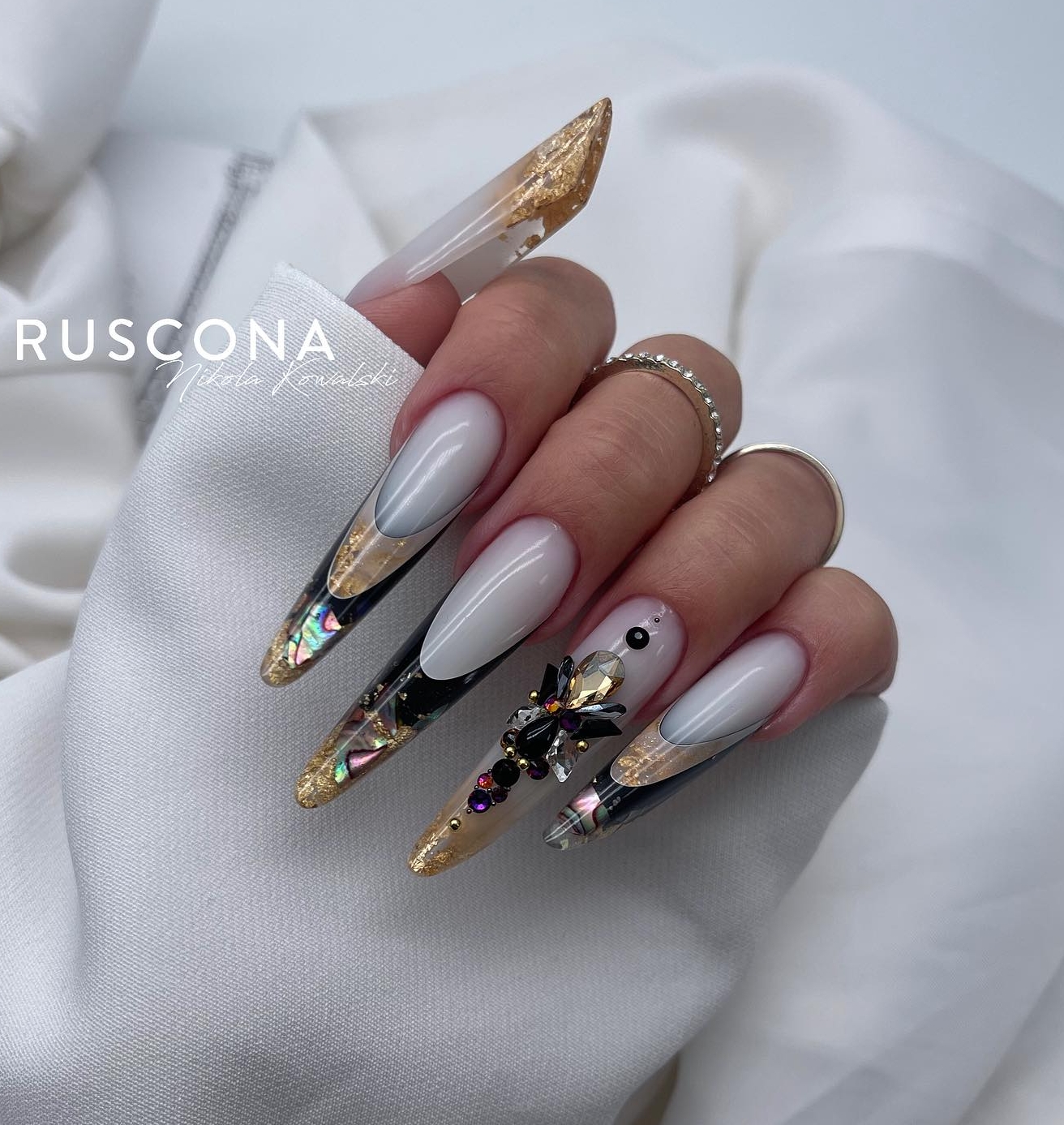 Long Acrylic Nails with Black and Gold Tips