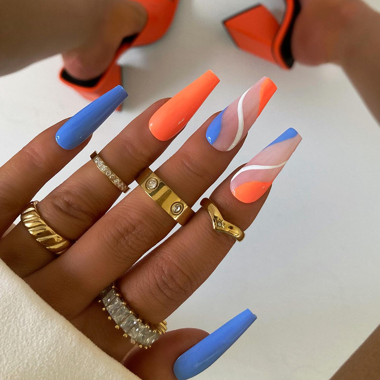 Long Coffin Orange and Blue Nail Design