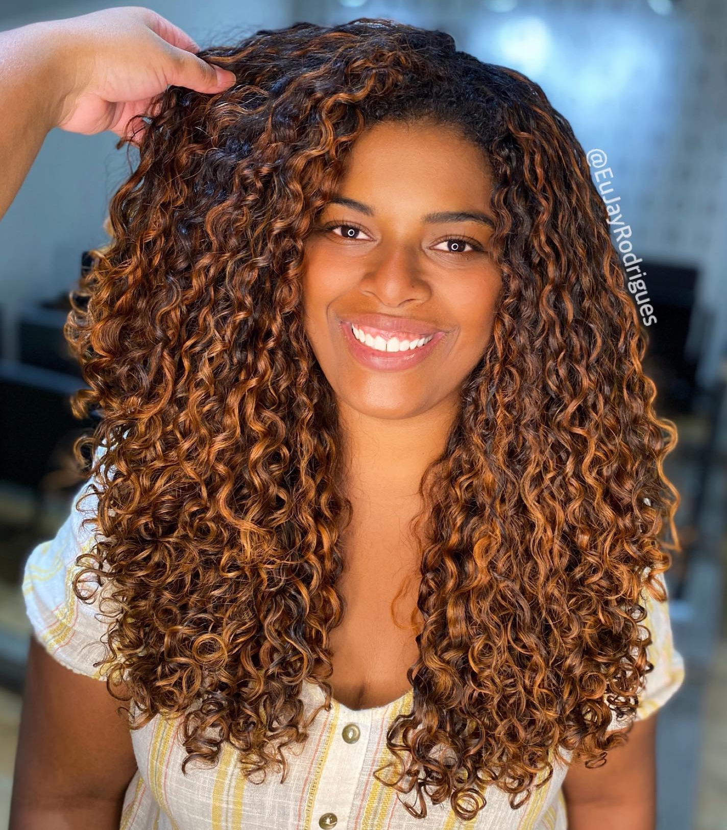 Naturally Curly Hair with Copper Highlights