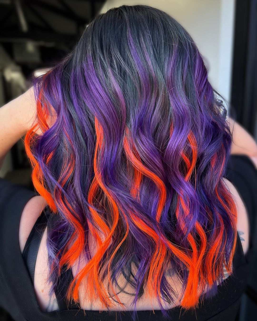 Orange and Purple Highlights on Dark Hair