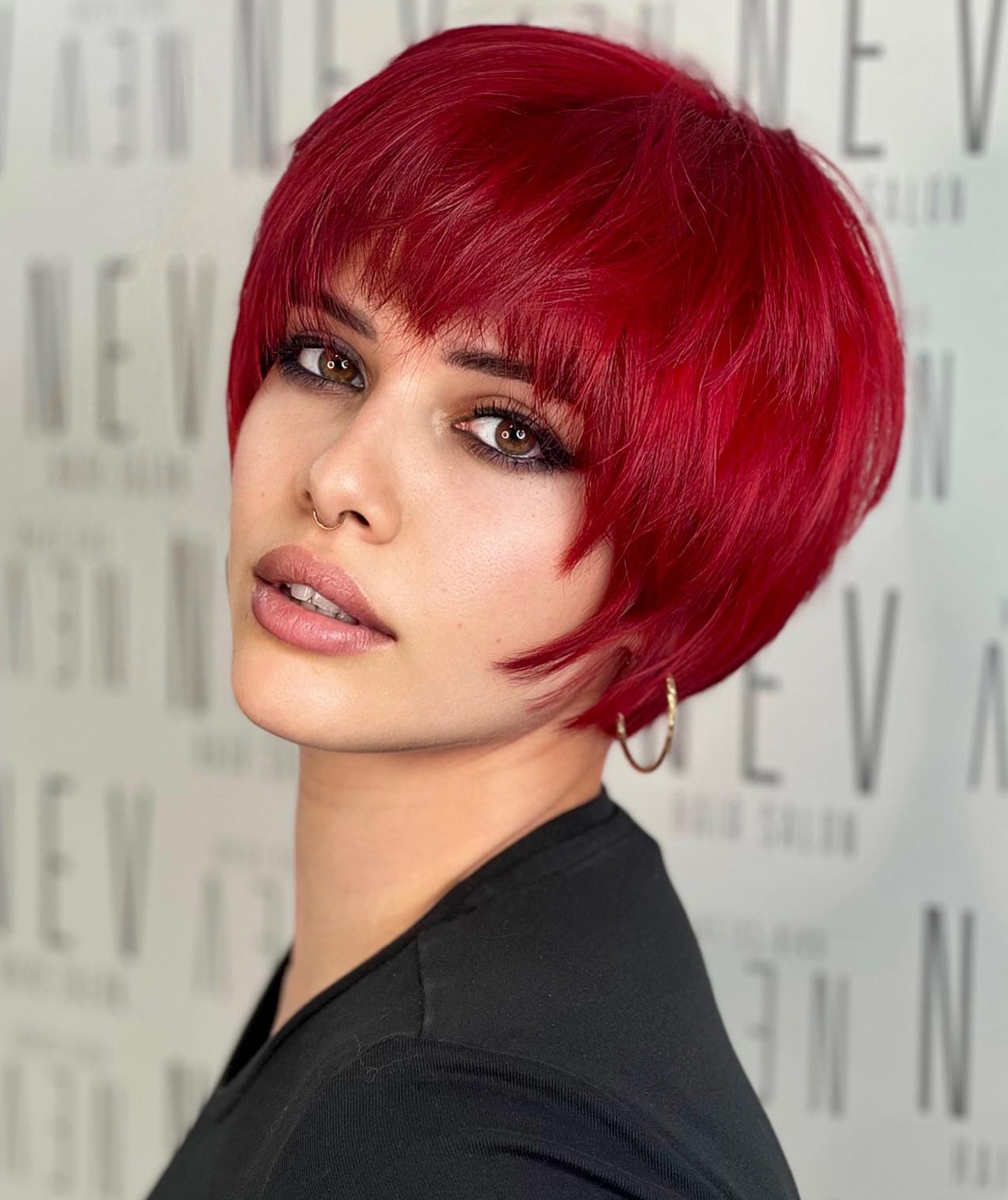 Pageboy Cut on Neon Red Hair Color