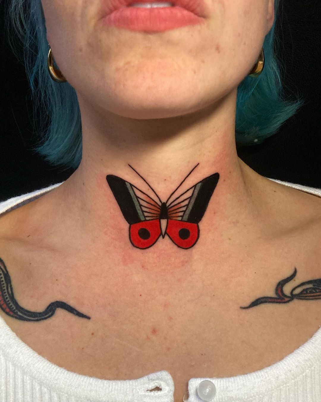 Black and Red Tattoo on Neck