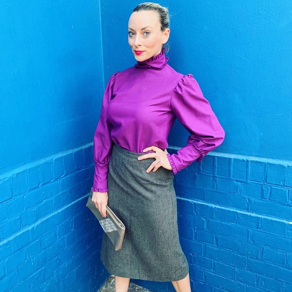 Bright Purple Blouse with Gray Skirt
