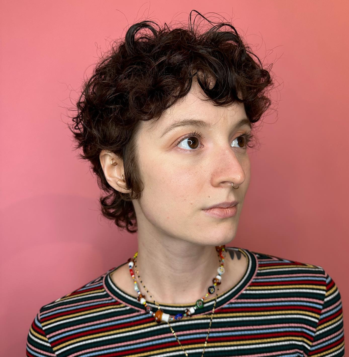 Curly Pixie with Bang on Dark Hair