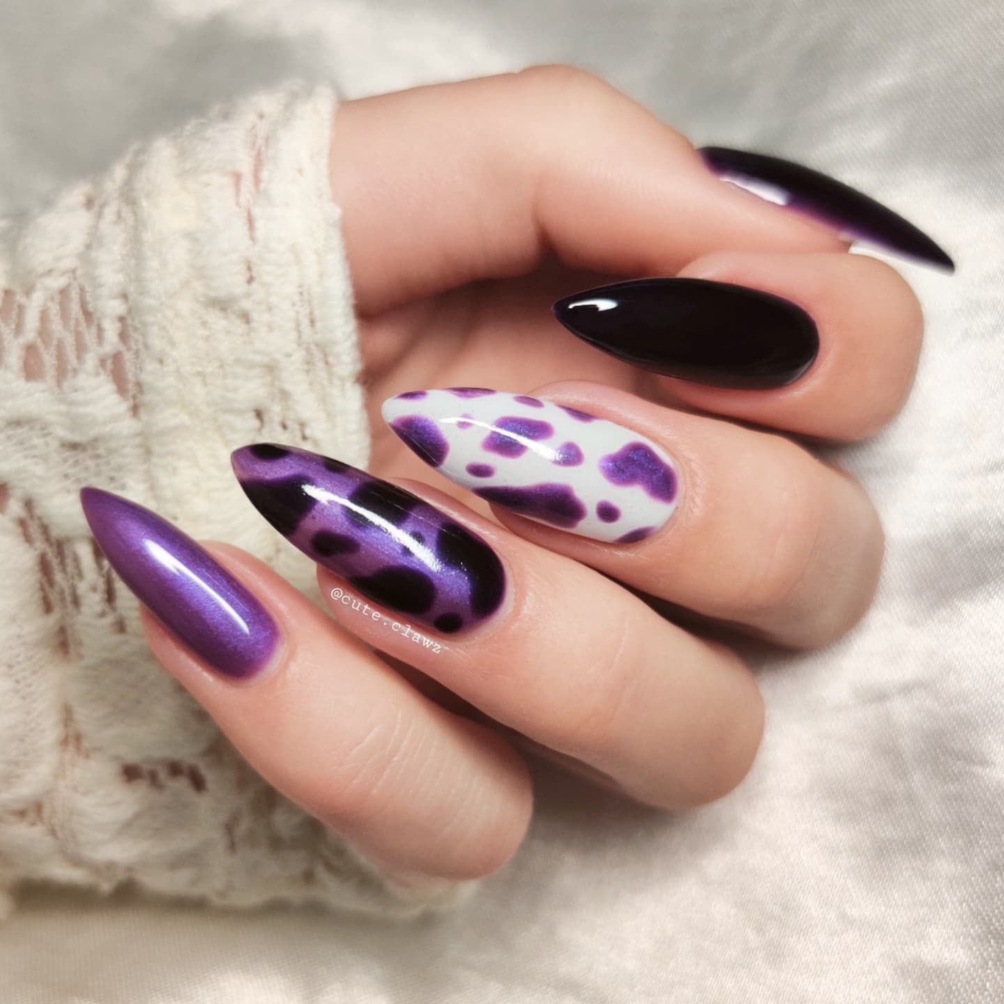 Long Purple Nails with Cow Print Design