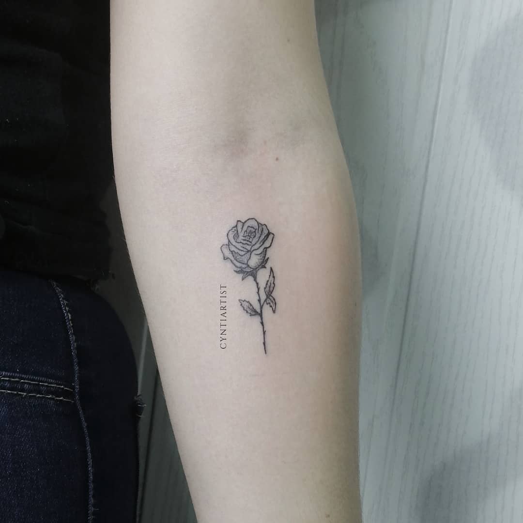 Captivating Minimalist Rose Tattoo