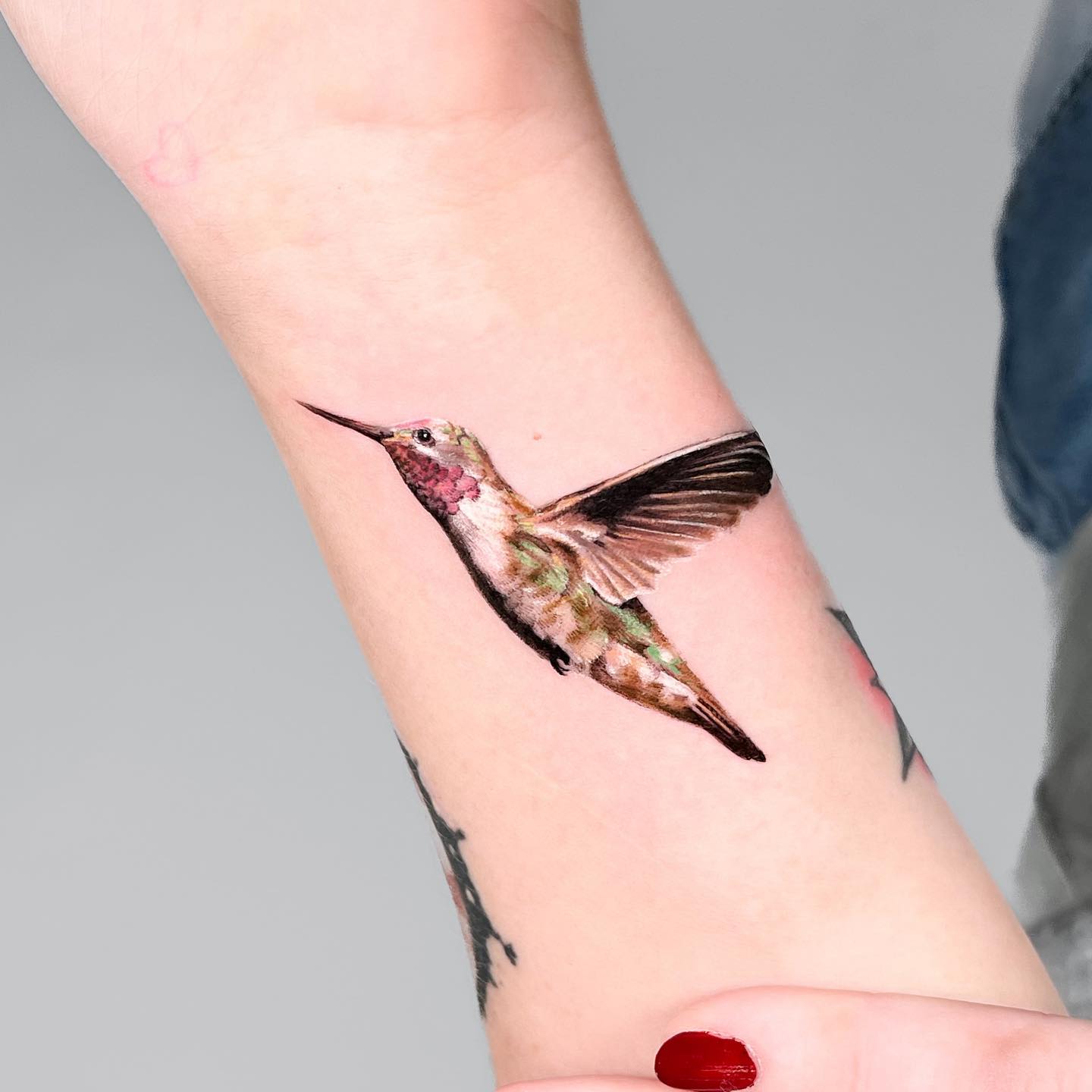Realistic Hummingbird Tattoo on Wrist