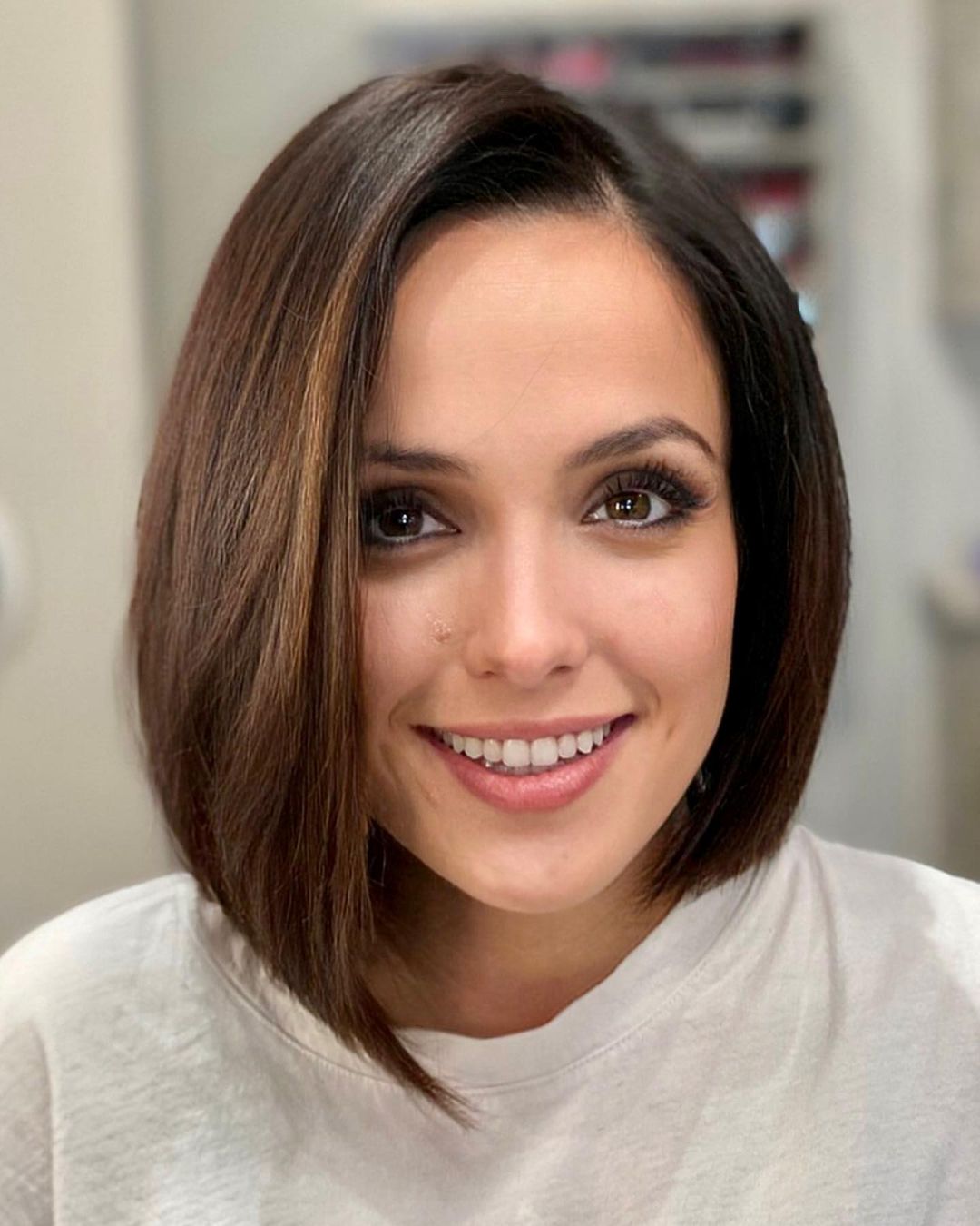 Sleek Asymmetrical Bob on Brown Hair