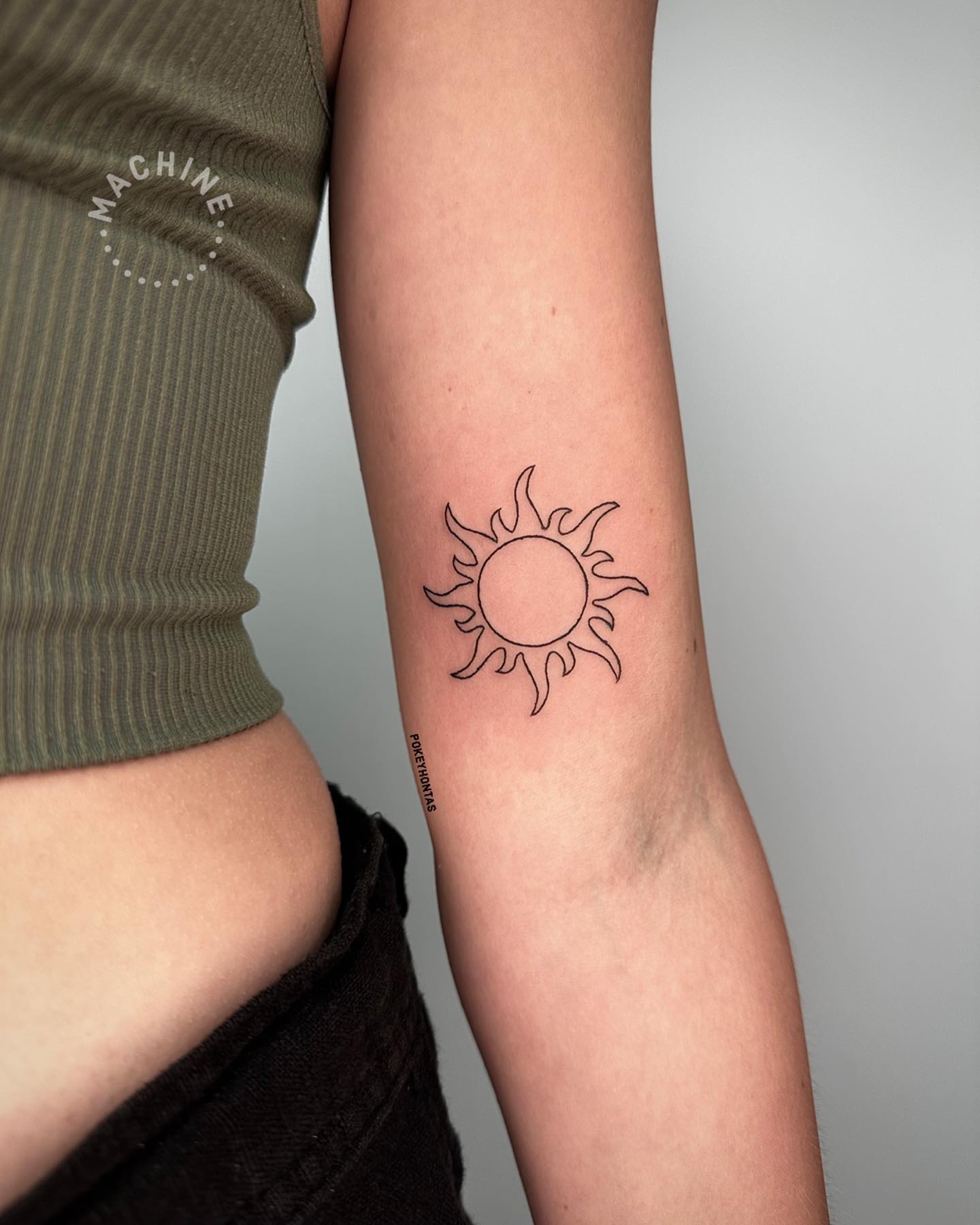 Tangled Sun Tattoo on Arm