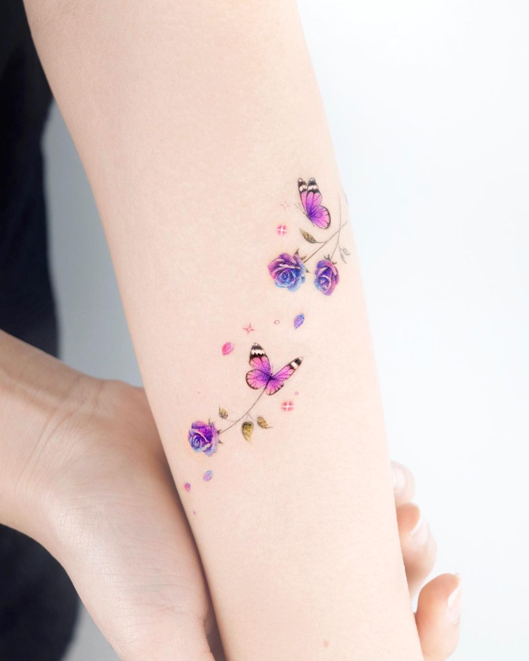 Colorful Small Butterfly Tattoo on Arm