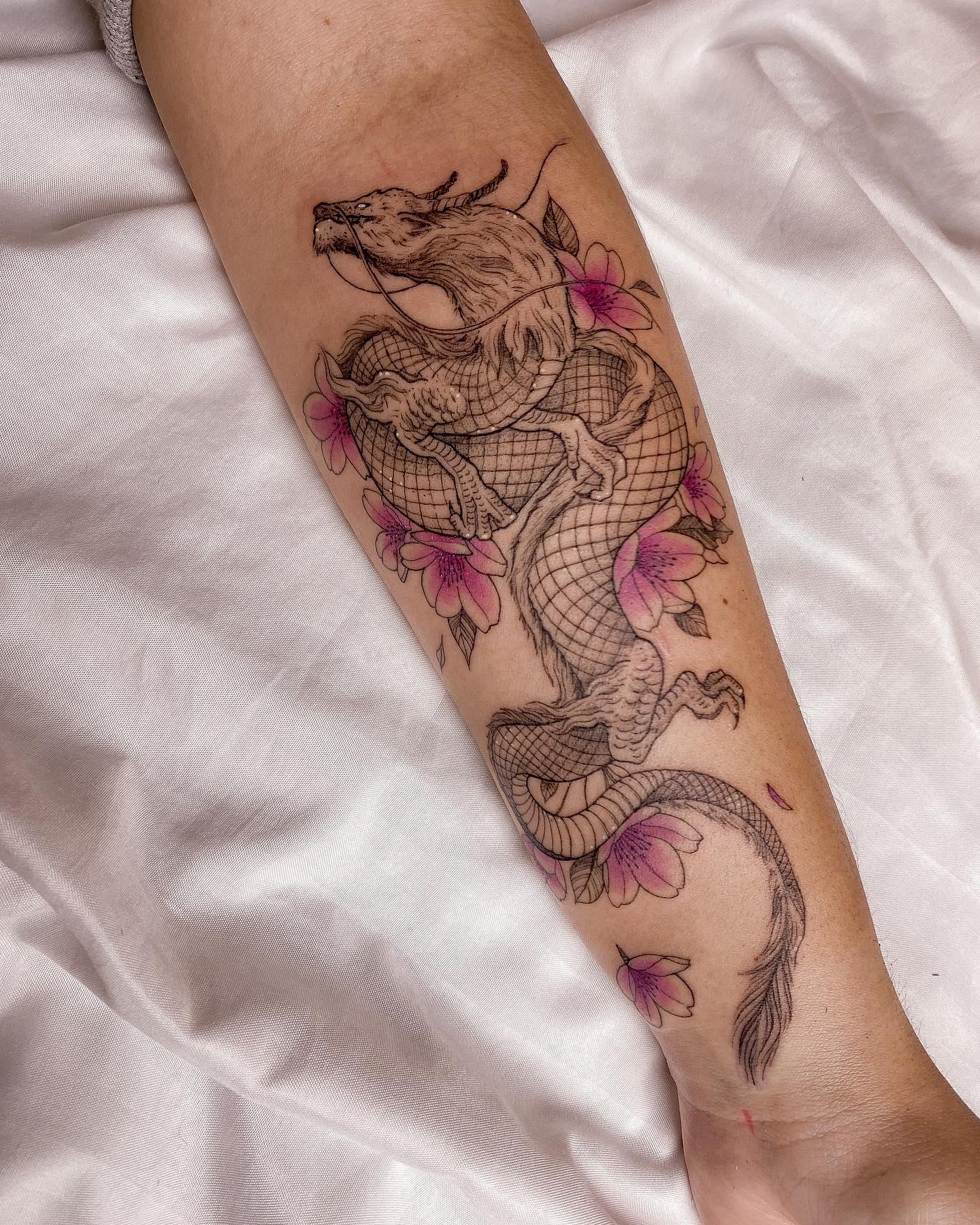 Japanese Dragon Tattoo with Pink Flowers on Arm