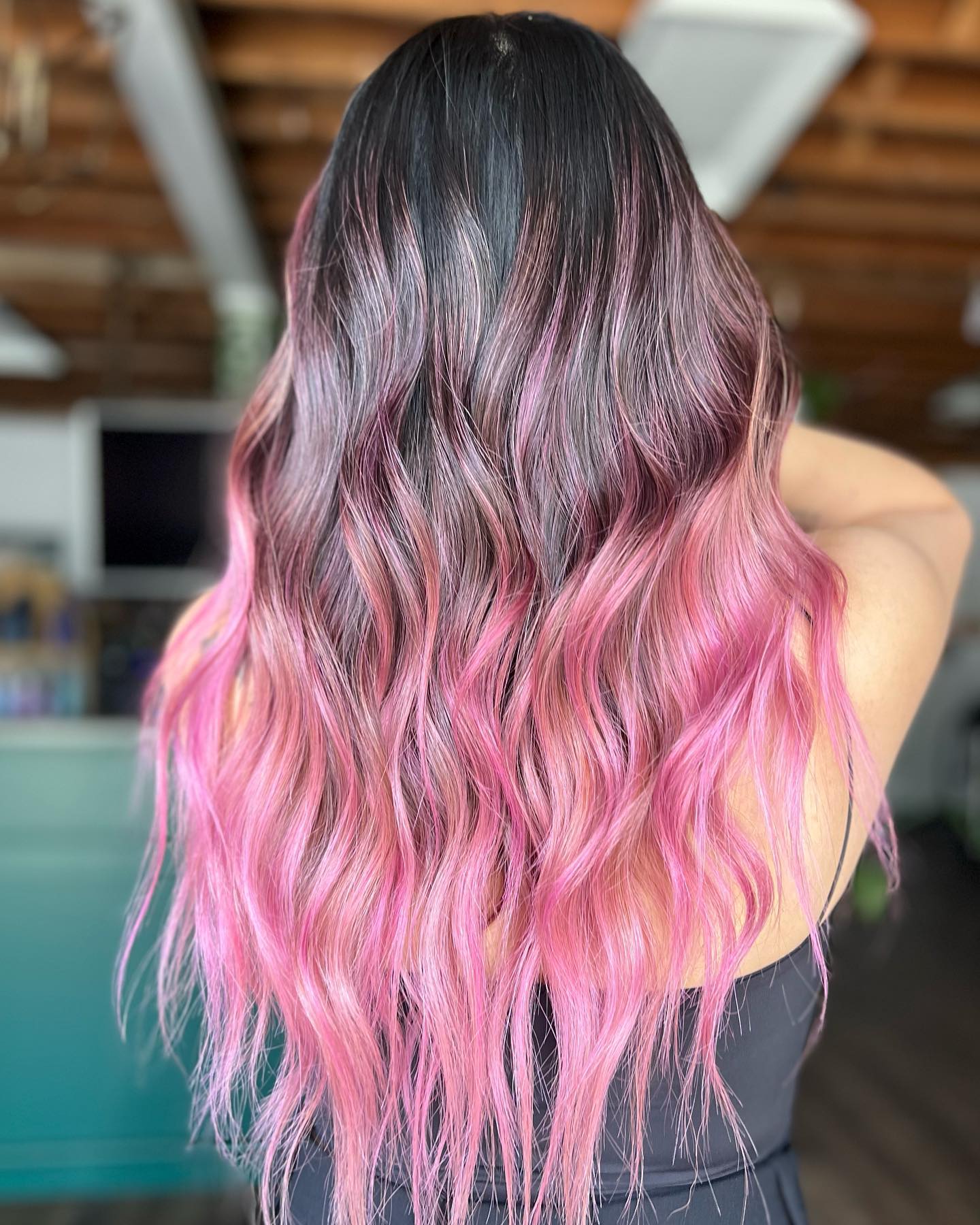 Light Pink Highlights on Long Wavy Dark Hair