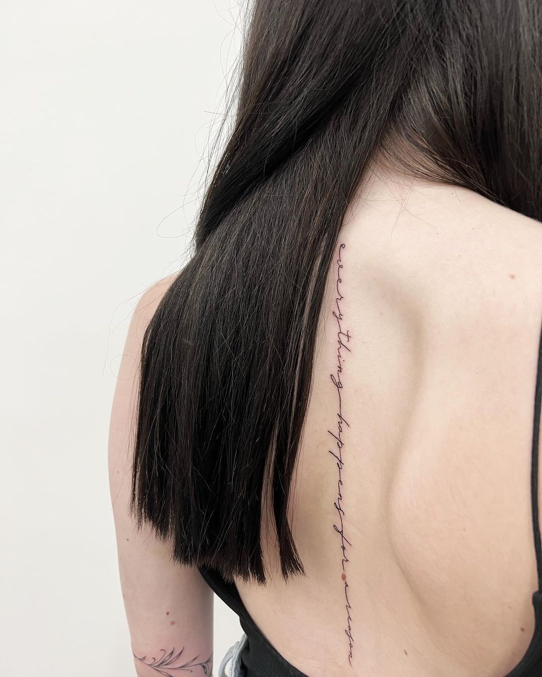 Quote Tattoo Along All Spine for Women
