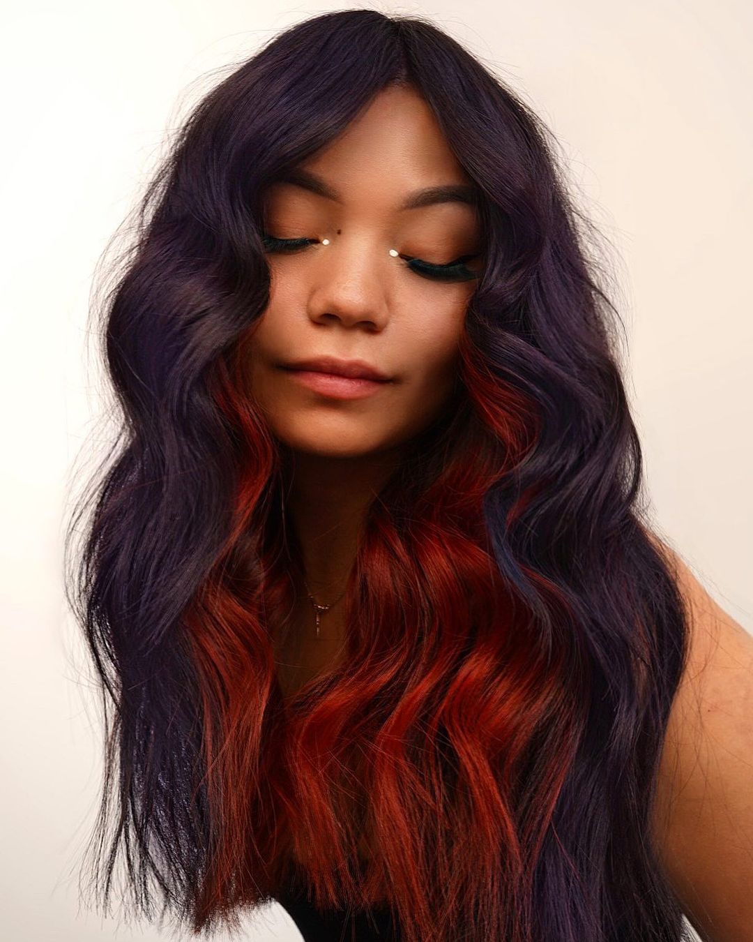 Dark Red Highlights on Dark Purple Hair