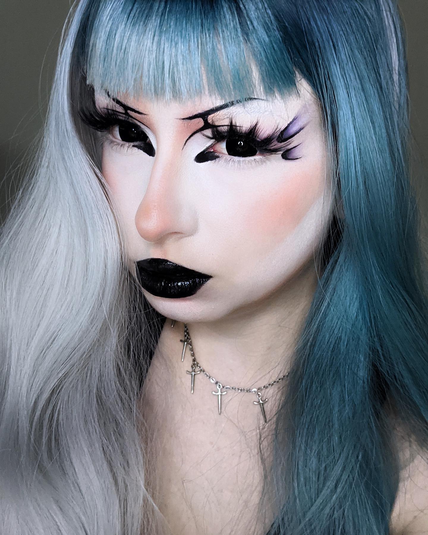 Graphic Goth Makeup with Glossy Black Lips