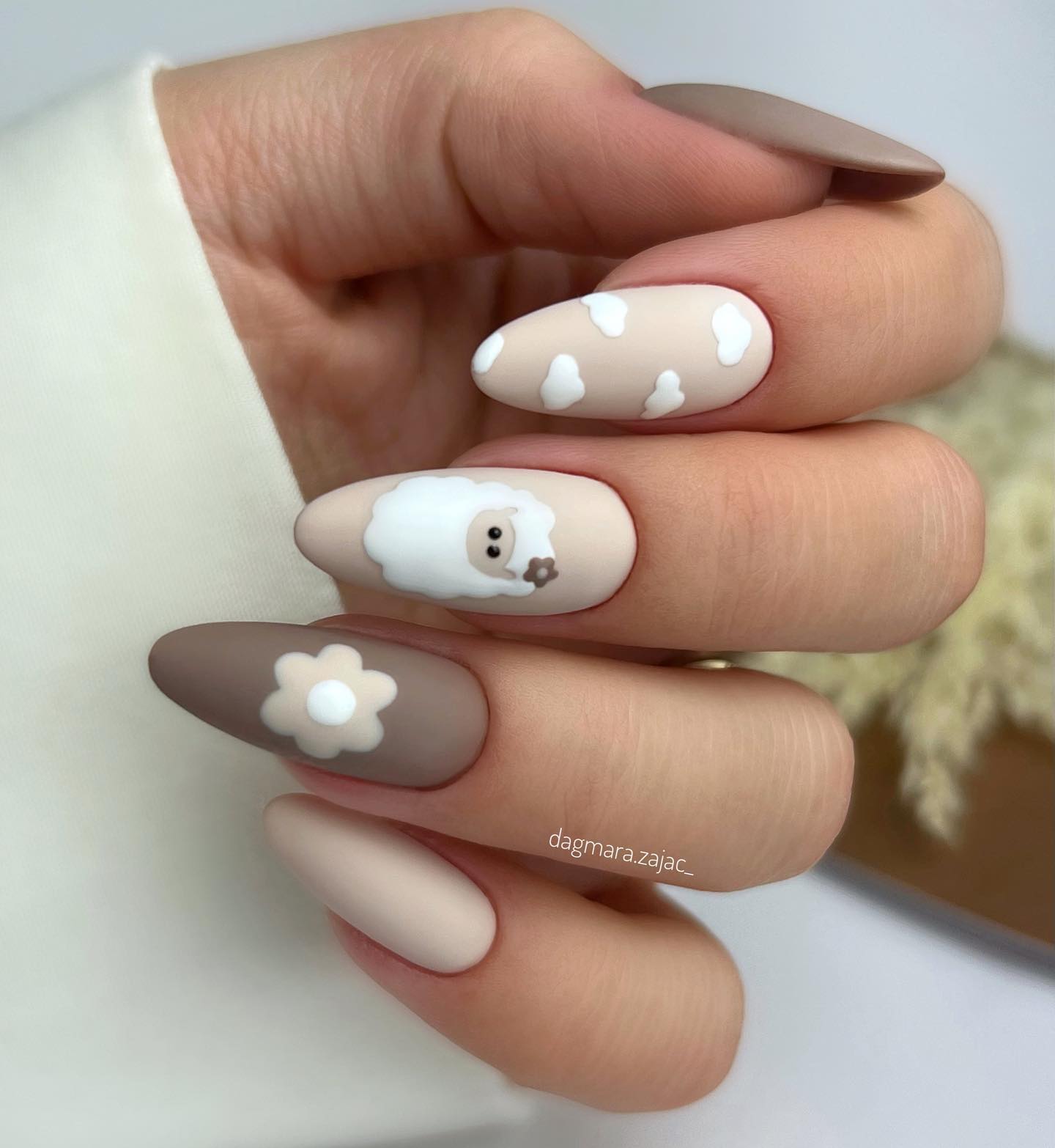 Matte Brown and White Nails with a Design