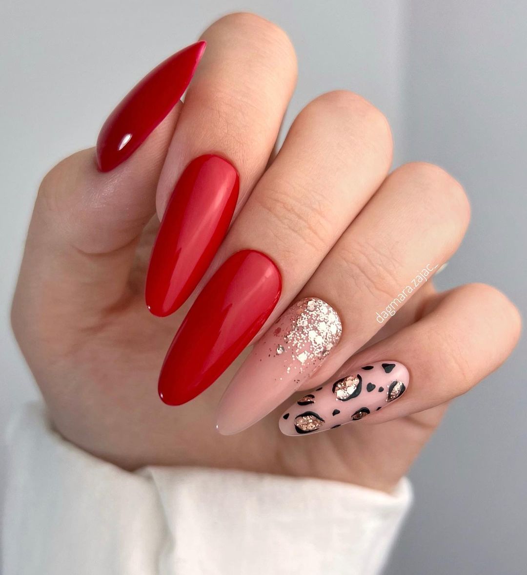 Red Almond Nails with Nude Glitter Design