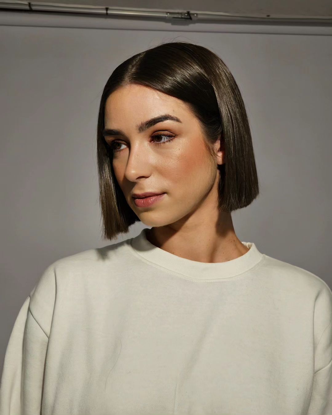 Short French Bob Cut on Straight Brown Hair