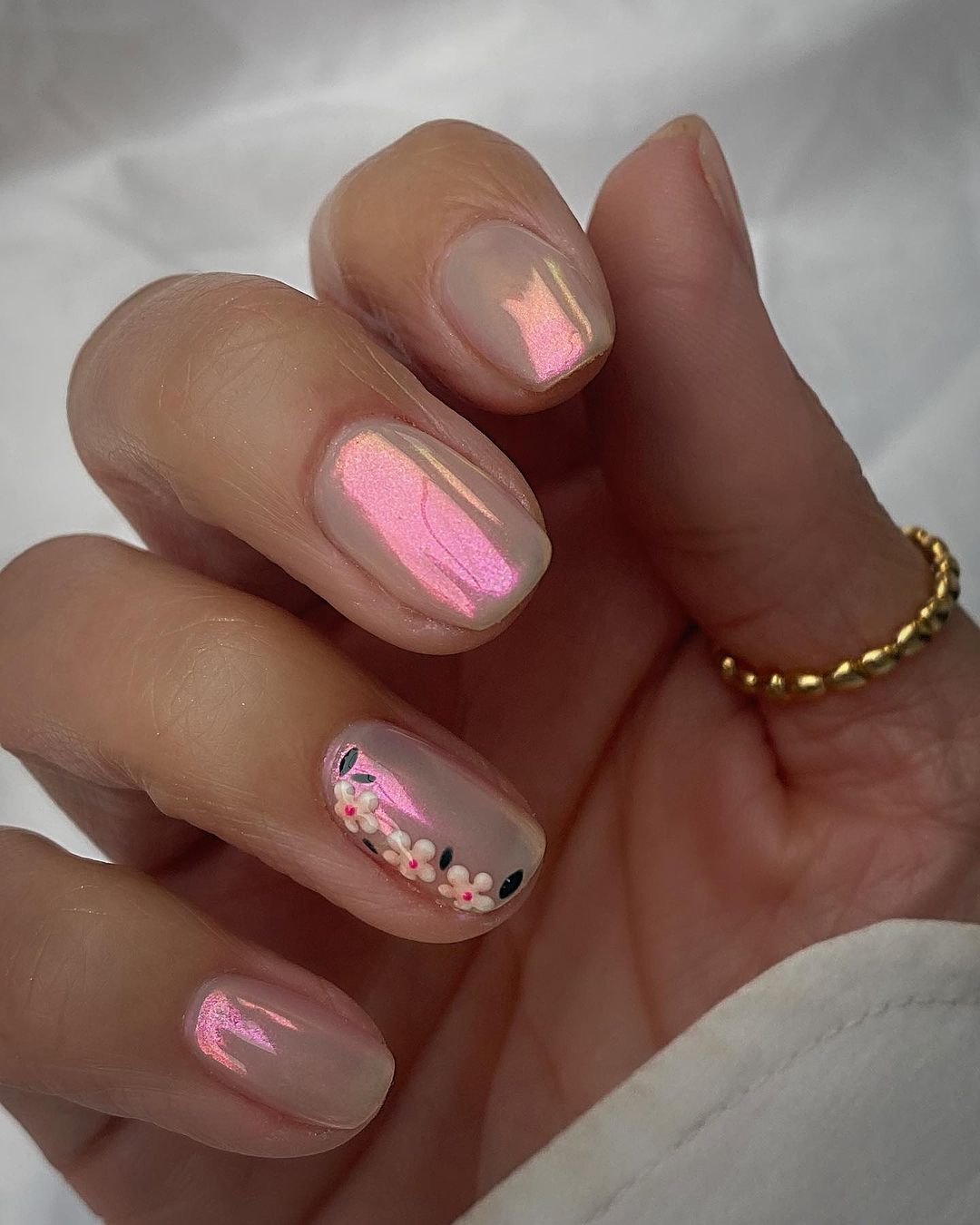 Short Pink Chrome Nails with Cherry Design