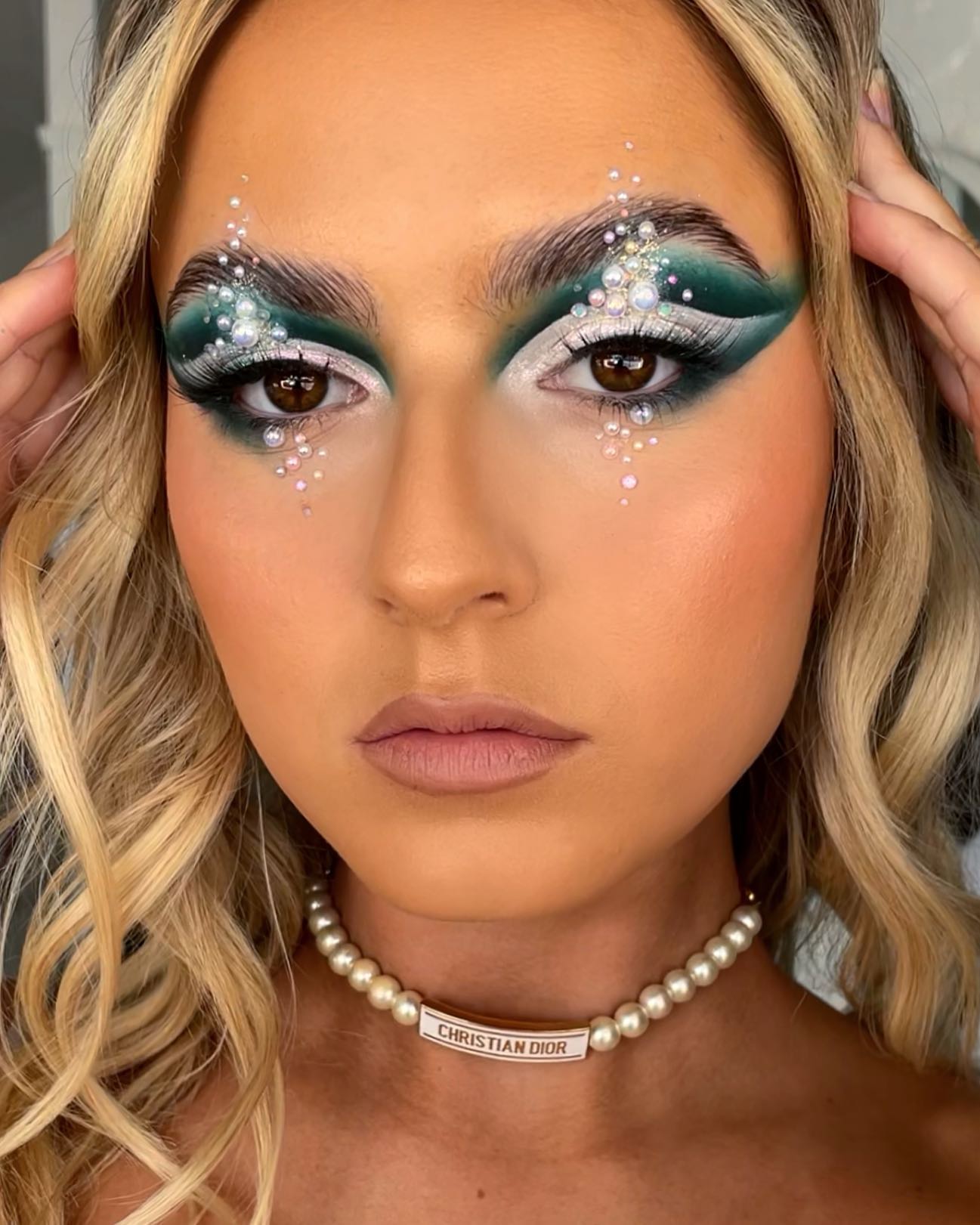 Green and White Eyeshadows with Rhinestone Makeup Look