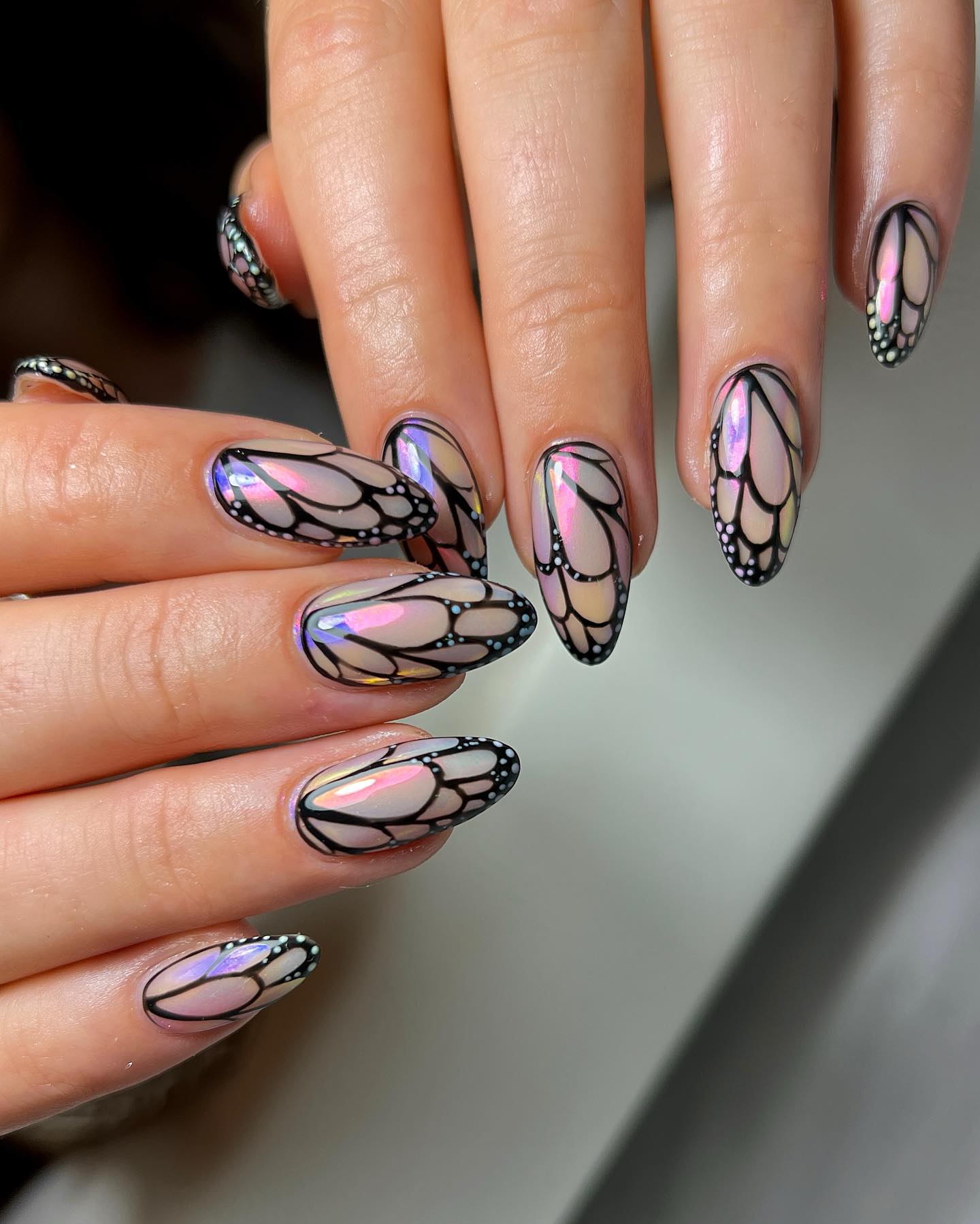 Oval Chrome Nails with Butterfly Design