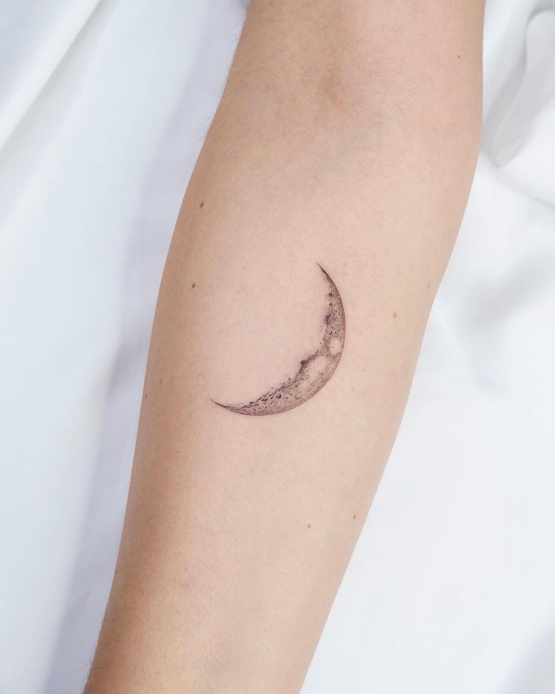 Delicate Minimalist Moon Tattoo