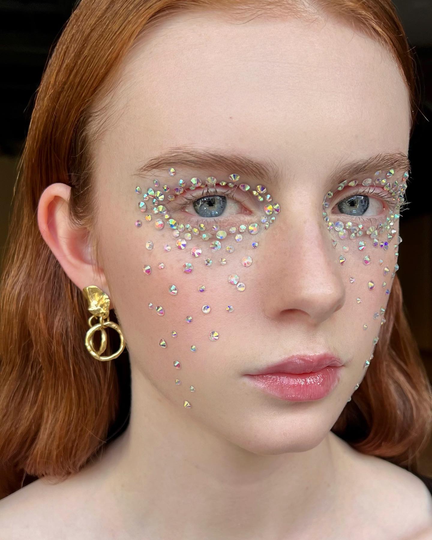 Nude Makeup with Rhinestones All Over Cheeks