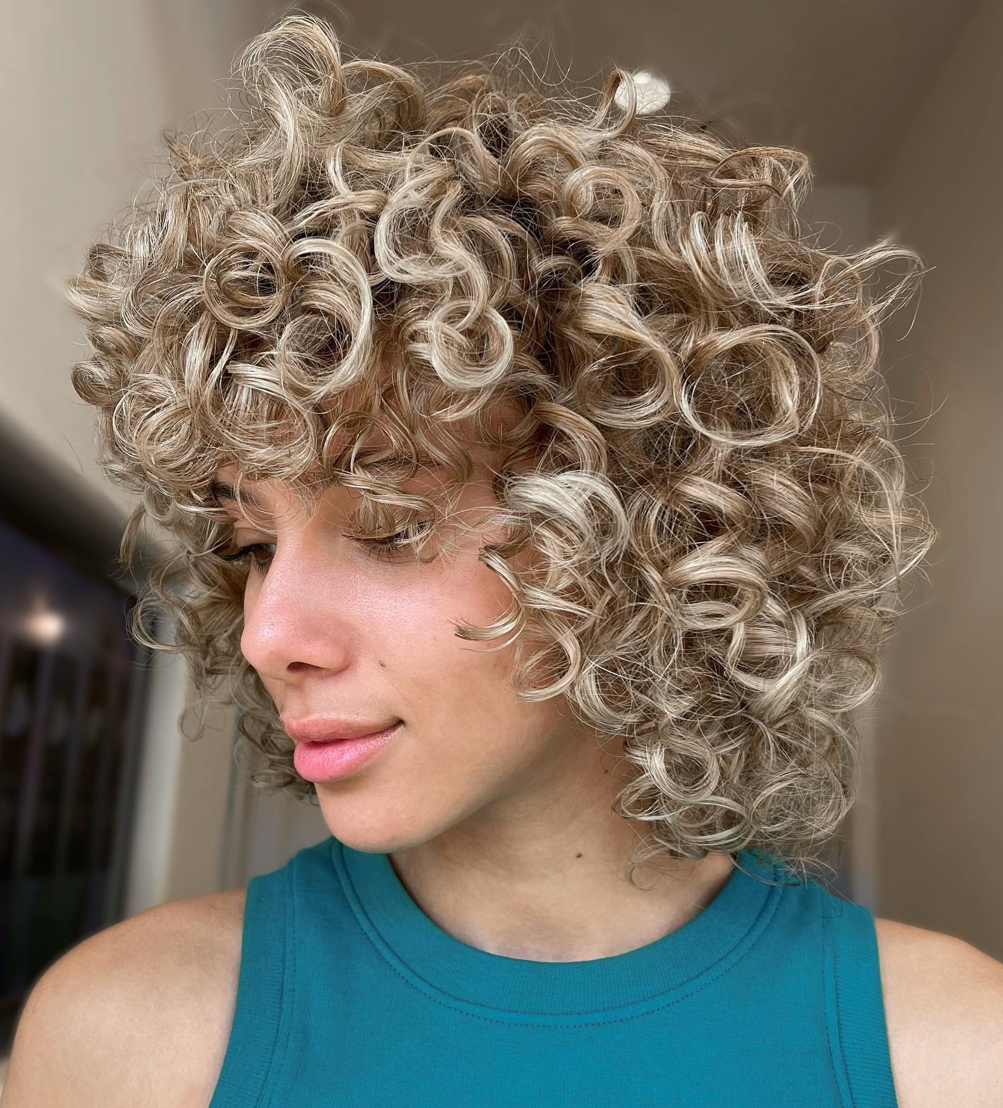 Curly Rounded Bob Cut on Blonde Hair