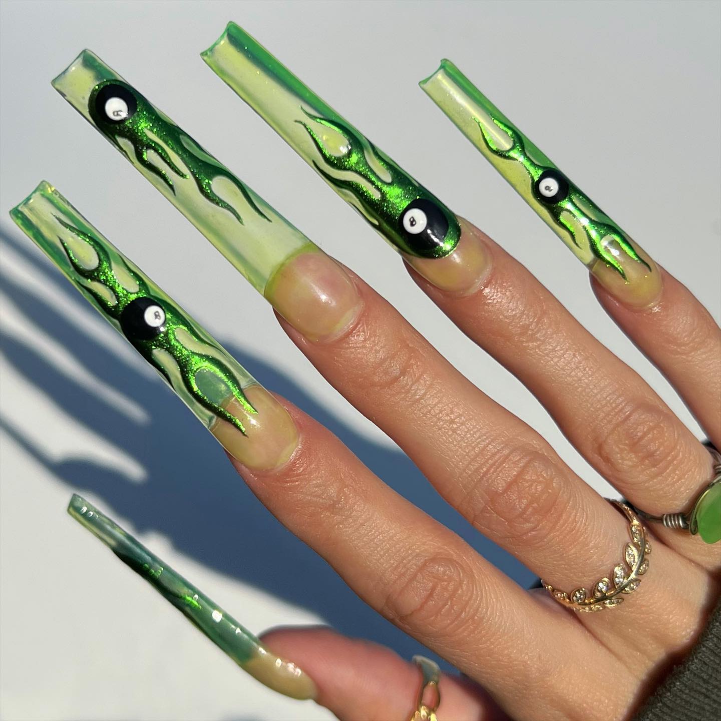 Long Clear Green Nails with Flame Design