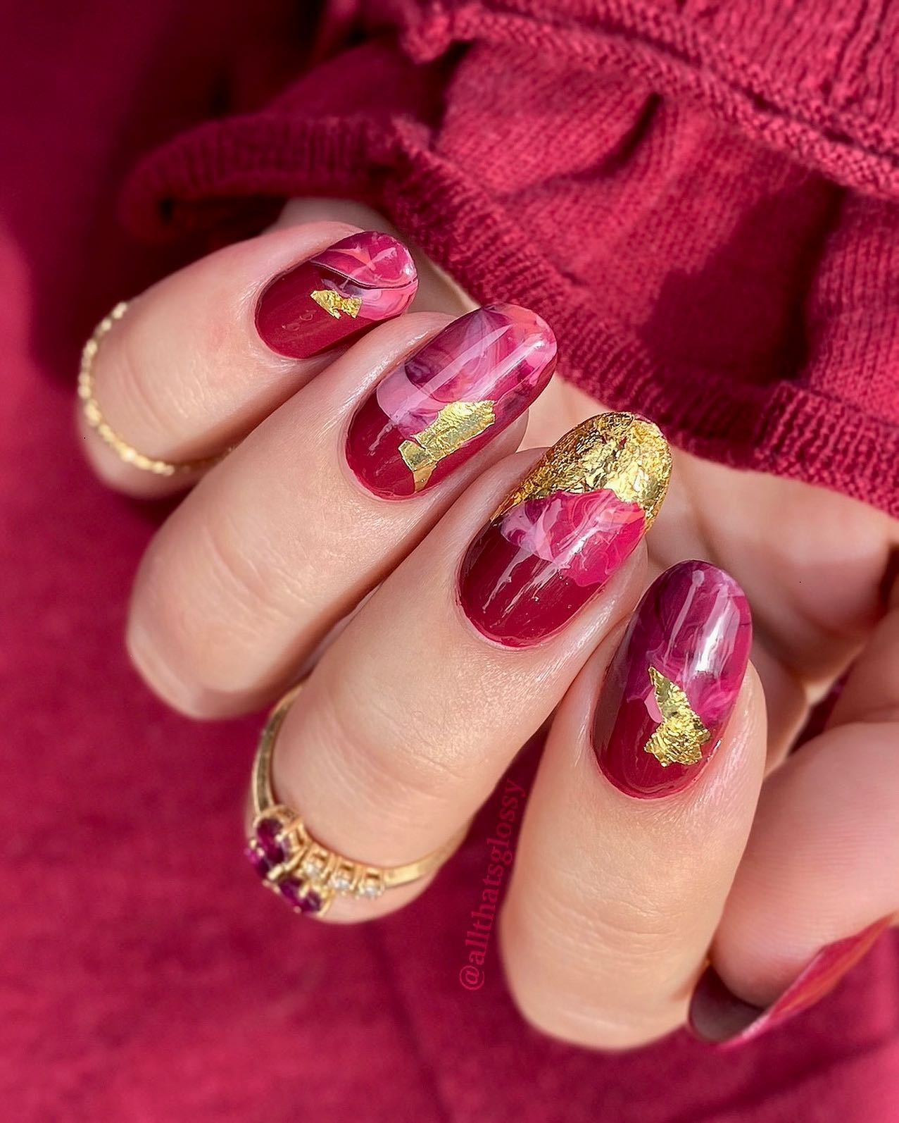 Round Light Burgundy Nails with Gold Foil and Marble Design