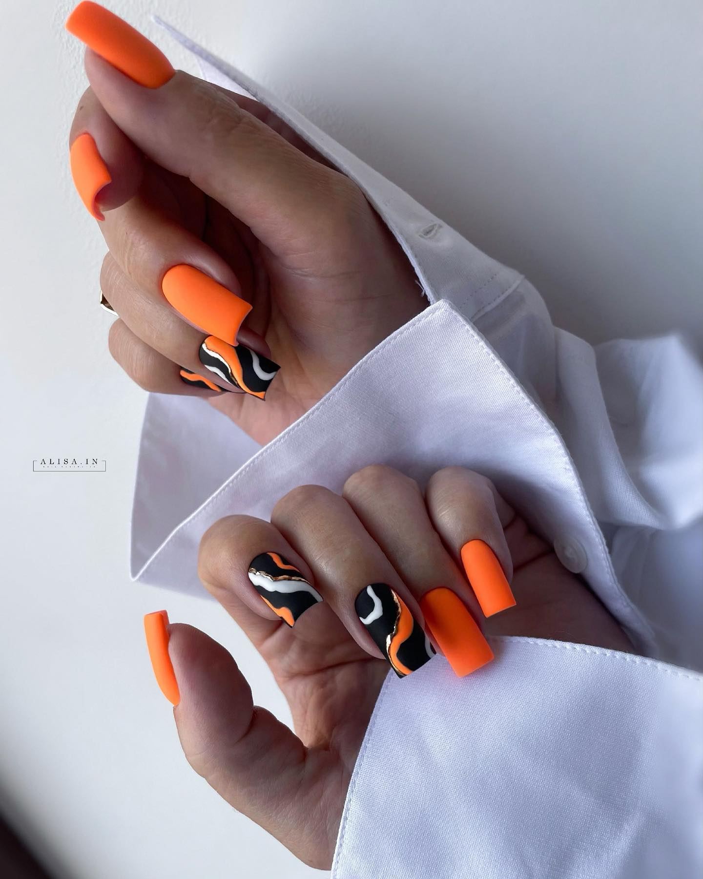 Square Orange and Black Matte Nails