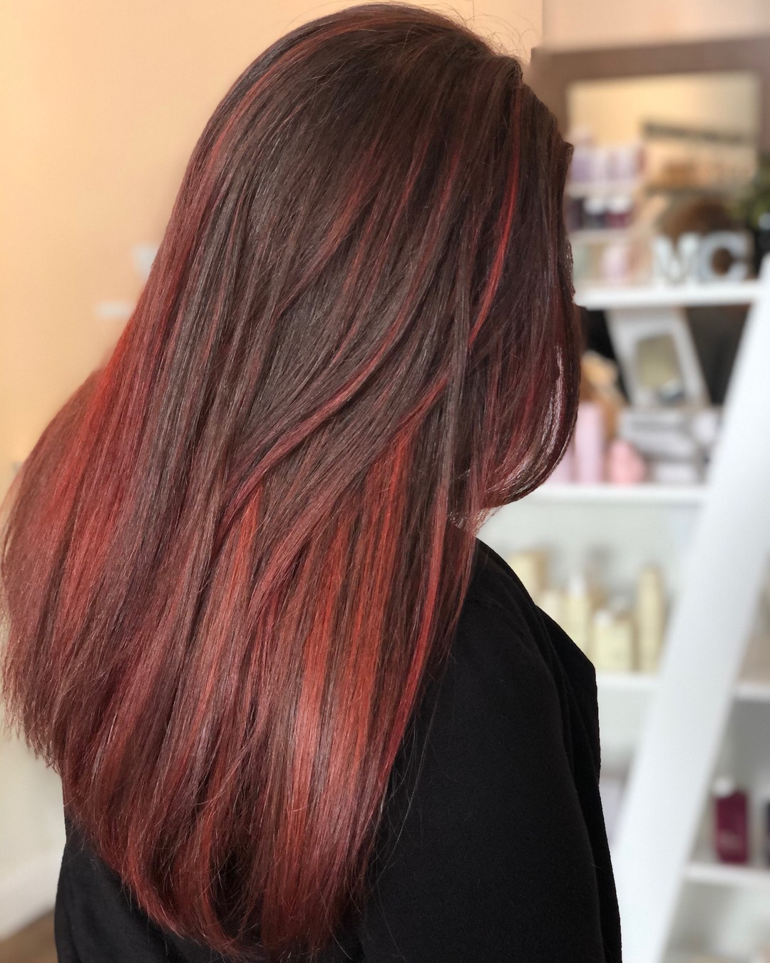 Straight Brown Hair with Metallic Red Hues