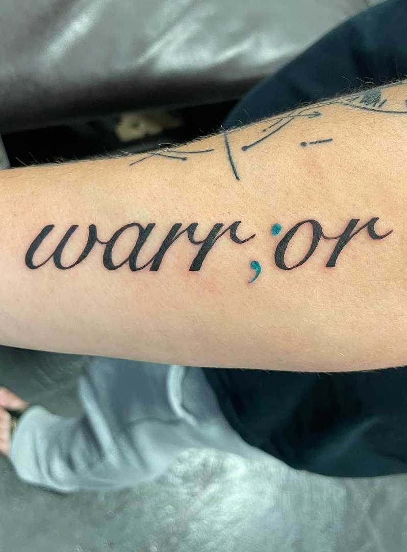 Word Warrior with Semicolon Tattoo on Arm