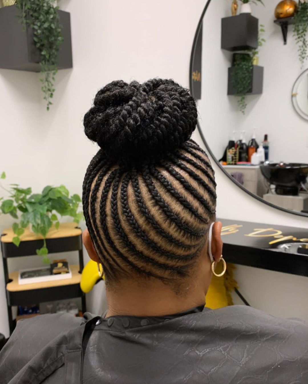 High Twist Bun with Cornrows on Black Hair