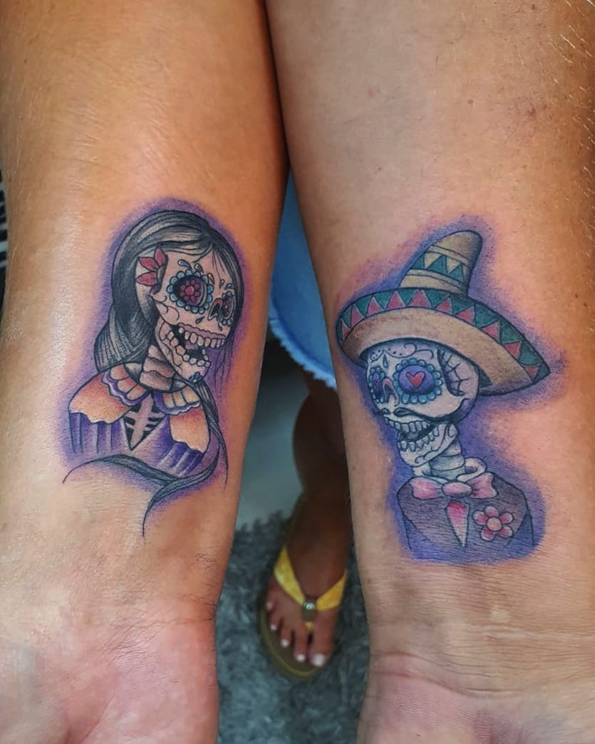 Skull Couple Tattoos Representing Life And Spirituality