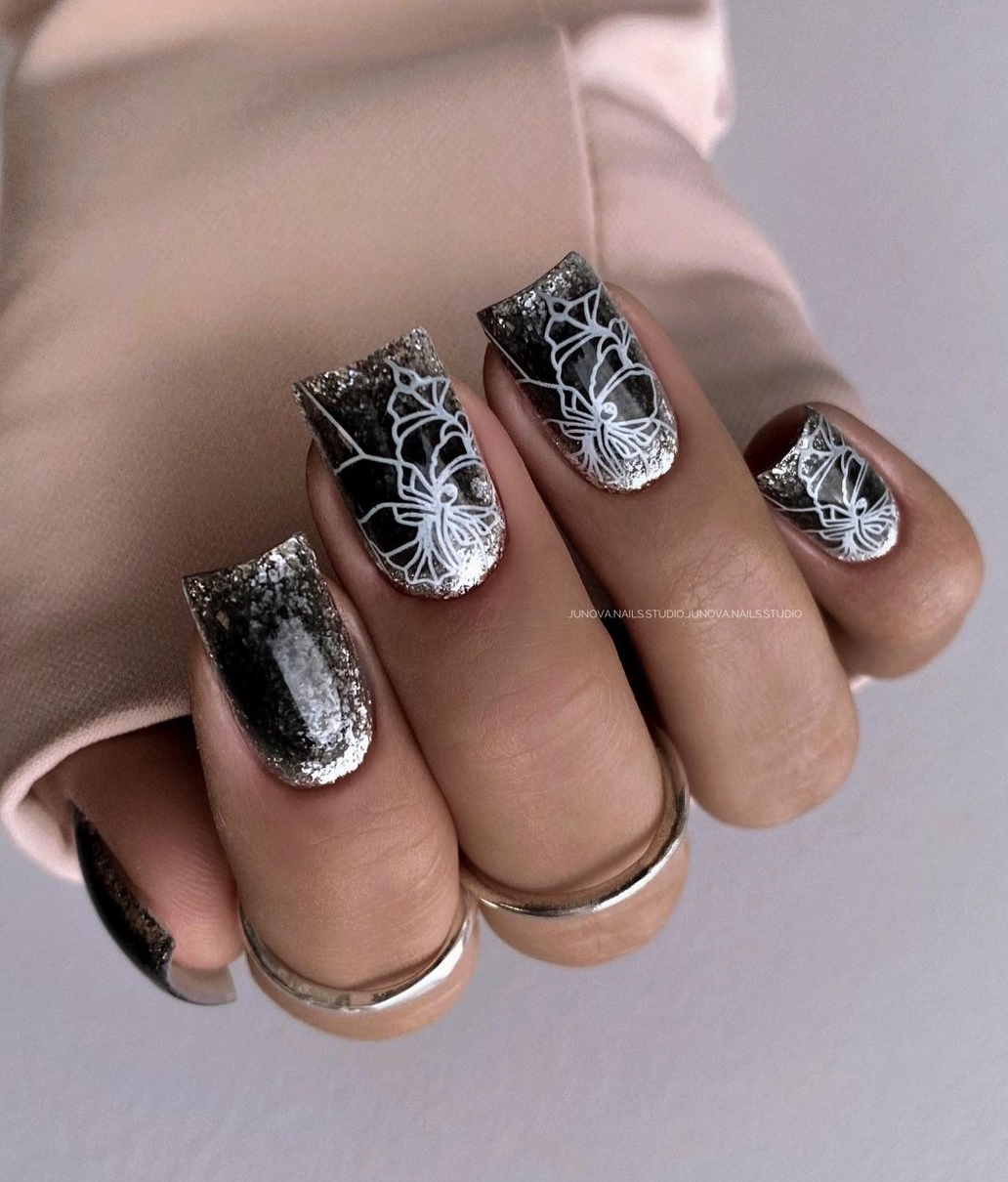 Square Black Nails with Glitter and White Floral Design